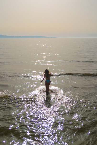 72-swimming-at-the-beach-riviera-olympia